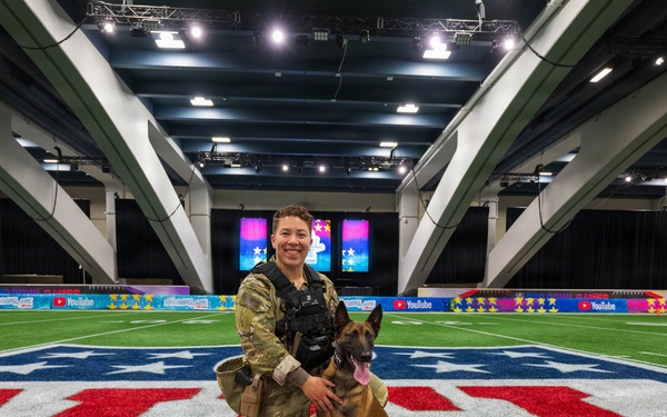 U.S. Coast Guard Maritime Safety and Security Team conduct K-9 sweeps in preparation for the Super Bowl.
