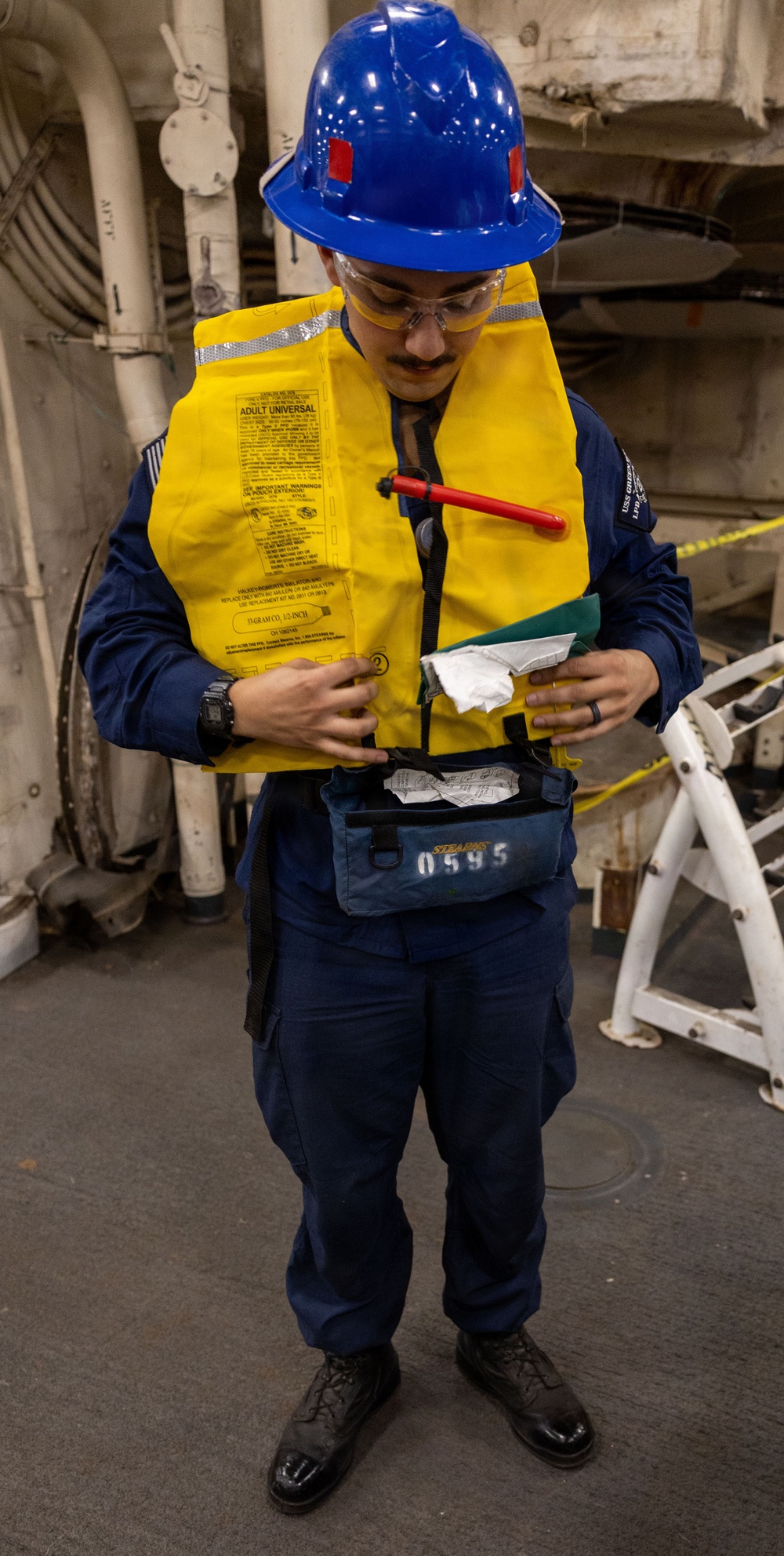 Deck Department Conducts Maintenance on Float Coats