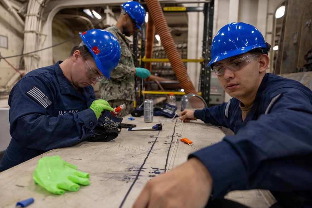 Deck Department Conducts Maintenance on Float Coats