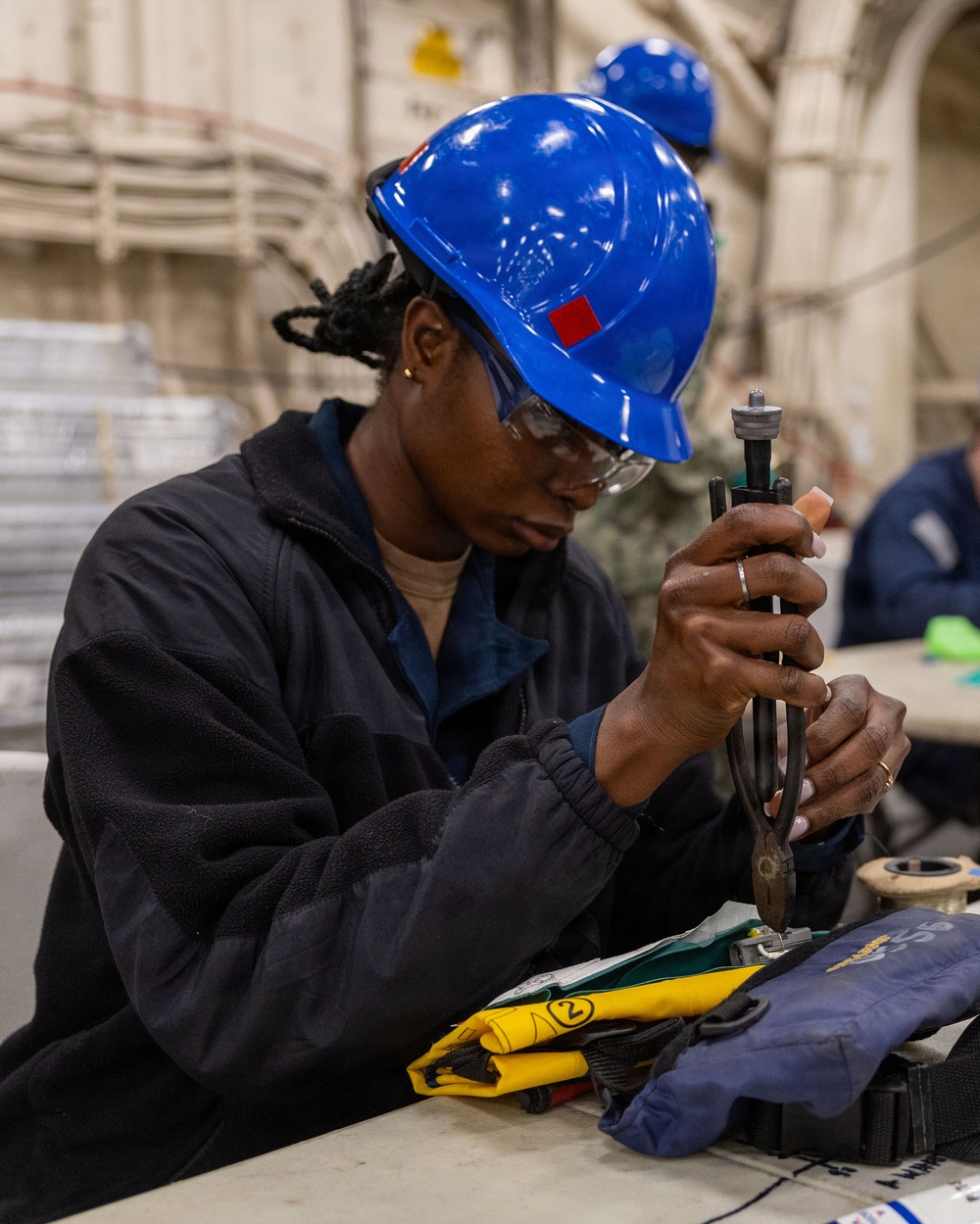 Deck Department Conducts Maintenance on Float Coats
