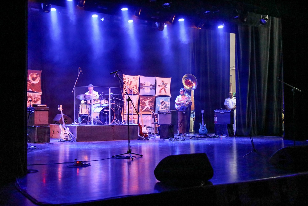 U.S. Naval Forces Europe and Africa Band (Topside Brass Band) perform at the Serge Constantin Theatre in Mauritius during Cutlass Express 2026 (CE 26)