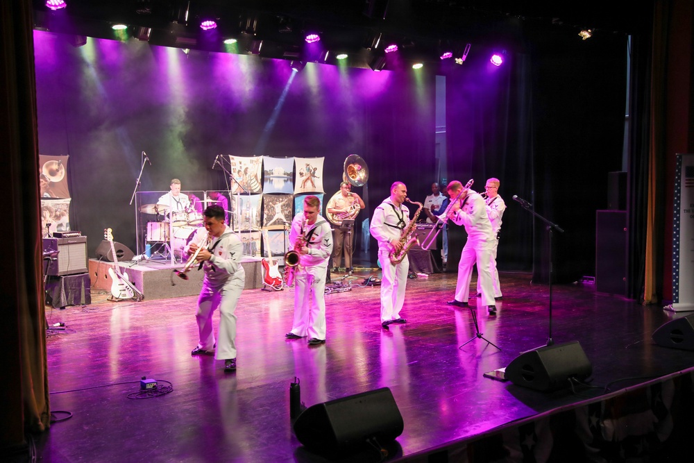 U.S. Naval Forces Europe and Africa Band (Topside Brass Band) perform at the Serge Constantin Theatre in Mauritius during Cutlass Express 2026 (CE 26)