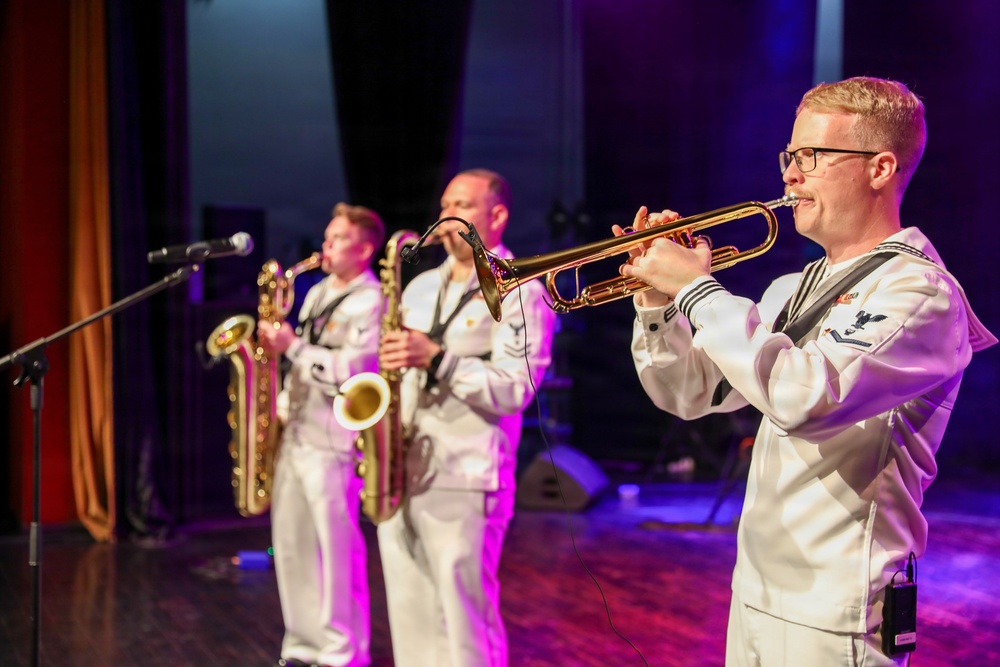 U.S. Naval Forces Europe and Africa Band (Topside Brass Band) perform at the Serge Constantin Theatre in Mauritius during Cutlass Express 2026 (CE 26)