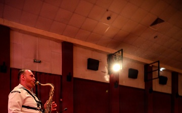 U.S. Naval Forces Europe and Africa Band (Topside Brass Band) perform at the Serge Constantin Theatre in Mauritius during Cutlass Express 2026 (CE 26)