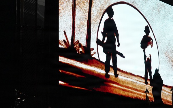 Sand art tells history of alliance