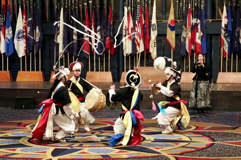 Traditional red lion dance fills ballroom