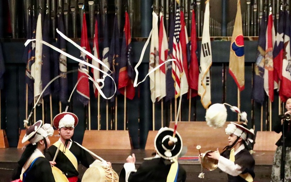 Traditional red lion dance fills ballroom