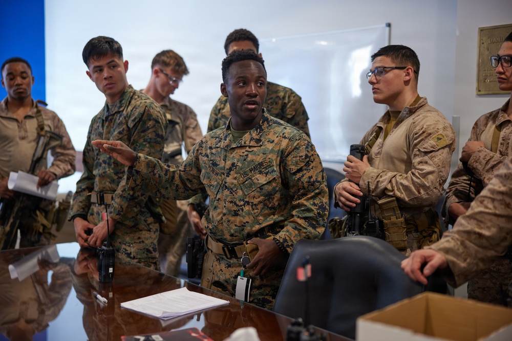 U.S. Marines with FAST Company Europe and Marine Security Guards conduct a emergency action test