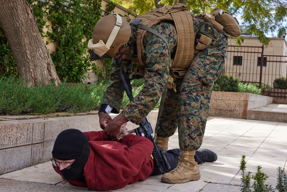 U.S. Marines with FAST Company Europe and Marine Security Guards conduct a emergency action test