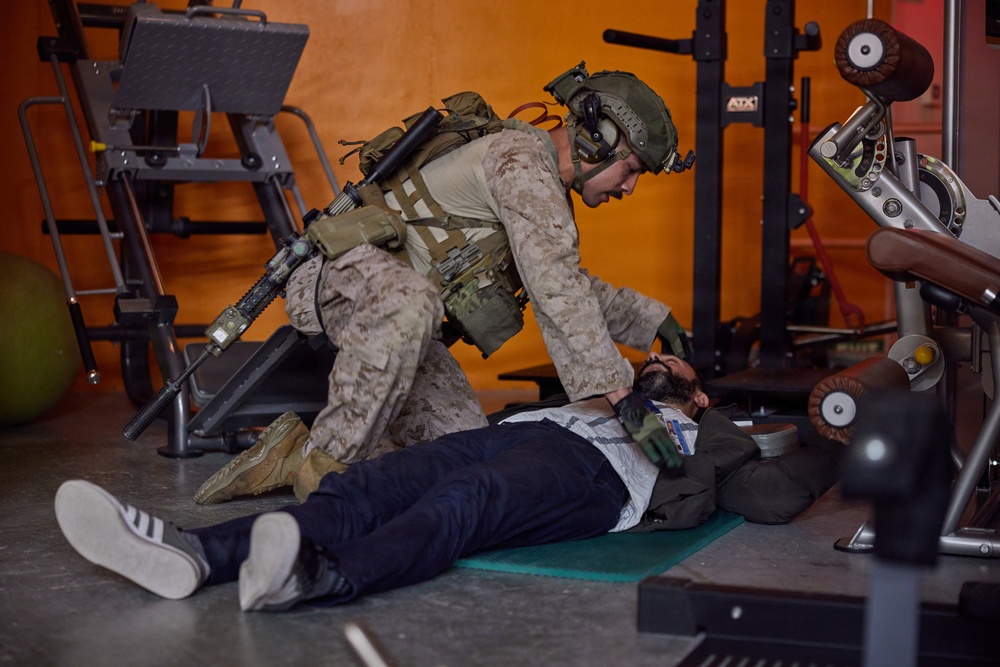 U.S. Marines with FAST Company Europe and Marine Security Guards conduct a emergency action plan test