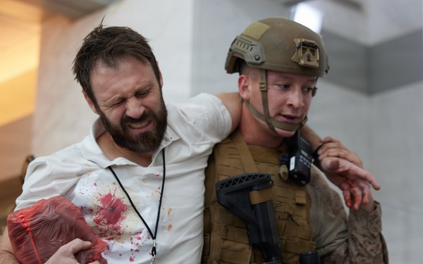 U.S. Marines with FAST Company Europe and Marine Security Guards conduct a emergency action test