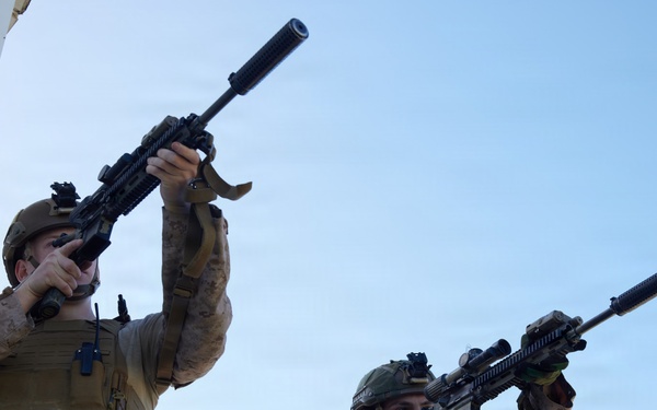 U.S. Marines with FAST Company Europe and Marine Security Guards conduct a emergency action test