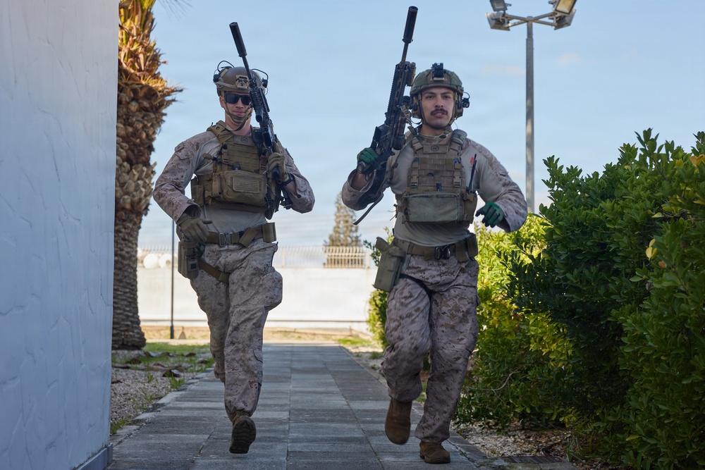 U.S. Marines with FAST Company Europe and Marine Security Guards conduct a emergency action test