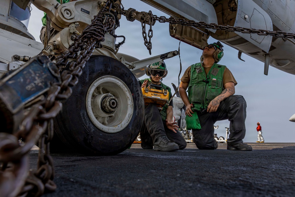 Abraham Lincoln conducts routine aircraft maintenance