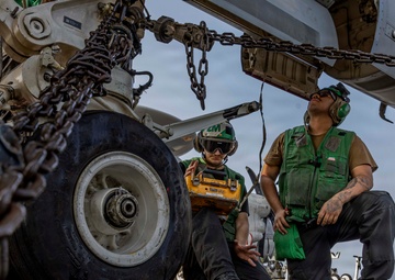 Abraham Lincoln conducts routine aircraft maintenance