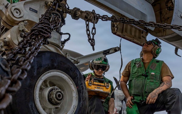 Abraham Lincoln conducts routine aircraft maintenance
