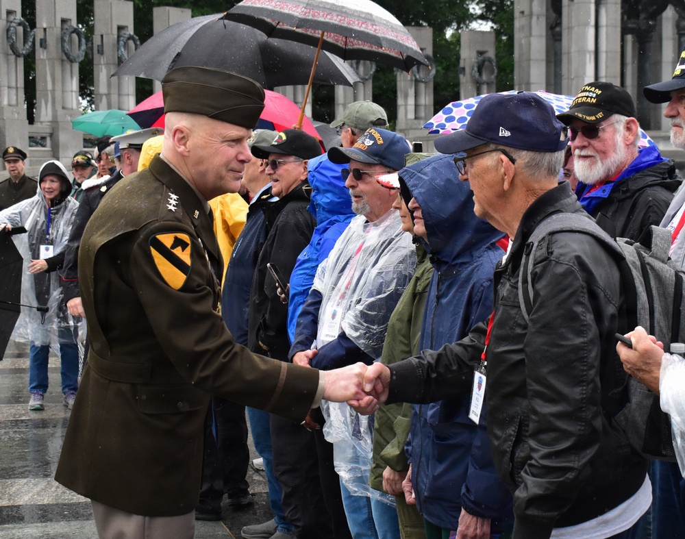 Lt. Gen. John Morrison Jr., the Army Deputy Chief of Staff, G-6, Greets Honor Flight Veterans at the WWII Memorial
