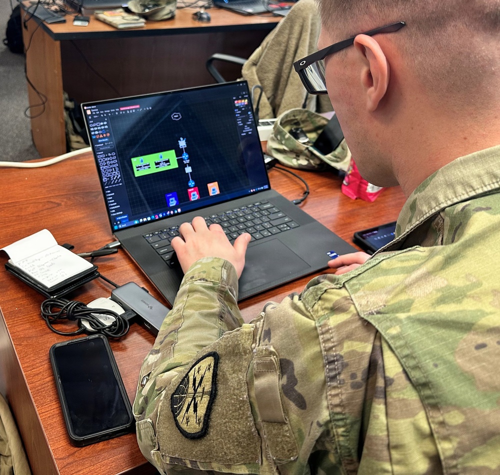 Cyber Analyst work to protect key information systems during Cyber Core Mini-Exercise