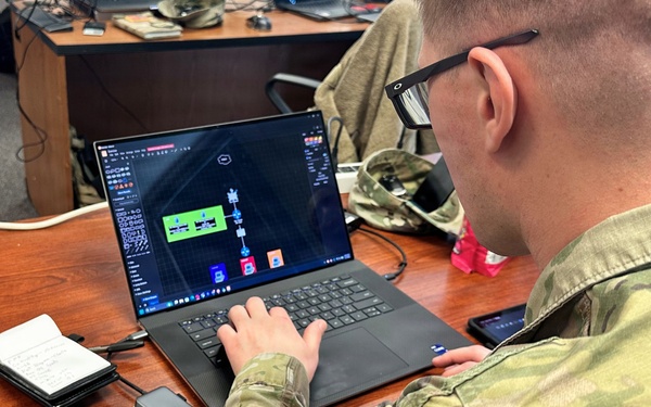 Cyber Analyst work to protect key information systems during Cyber Core Mini-Exercise