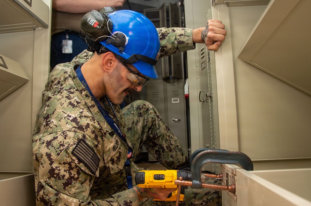 Ronald Reagan Sailors Install Berthing and Conduct Damage Control Drill