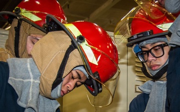 Ronald Reagan Sailors Install Berthing and Conduct Damage Control Drill