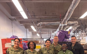 Ensigns learn about NAVSUP FLC Jacksonville's postal operations at NS Mayport