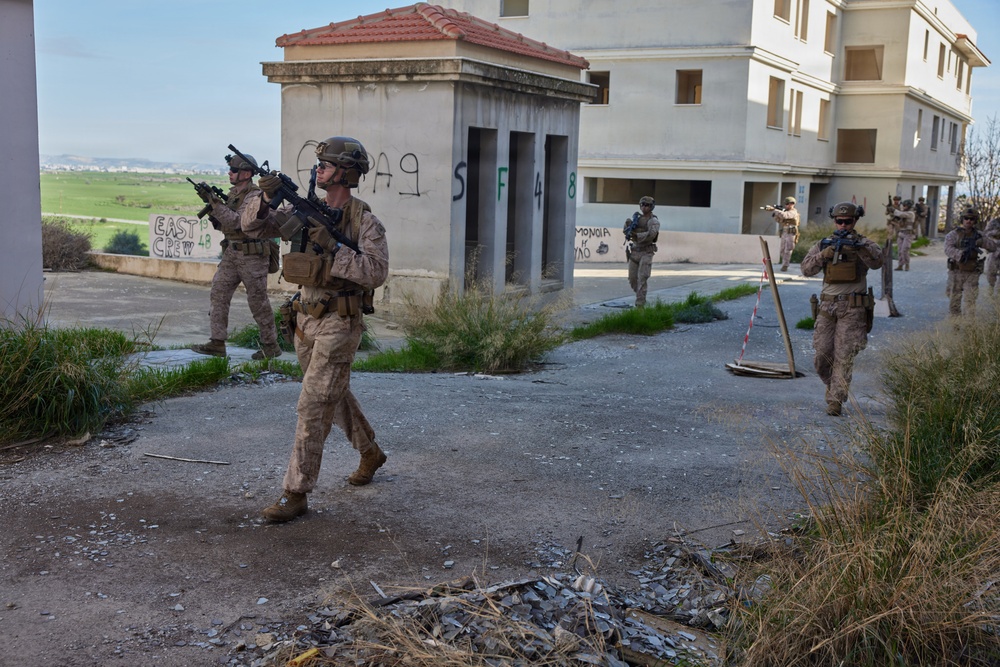 U.S. Marines with FAST Company Europe conduct live sim close quarter battle training