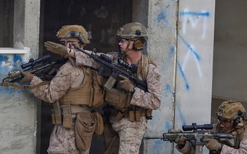 U.S. Marines with FAST Company Europe conduct live sim close quarter battle training