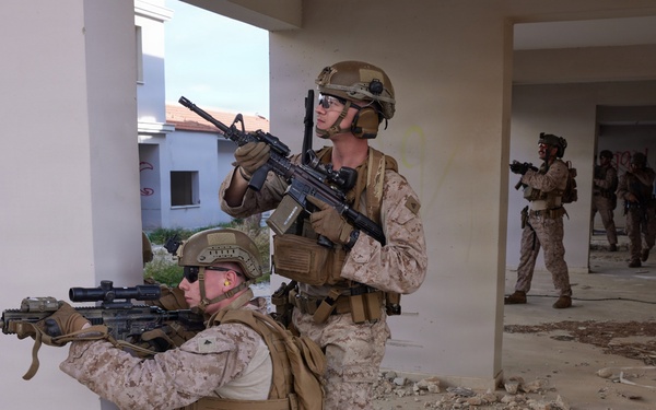 U.S. Marines with FAST Company Europe conduct live sim close quarter battle training