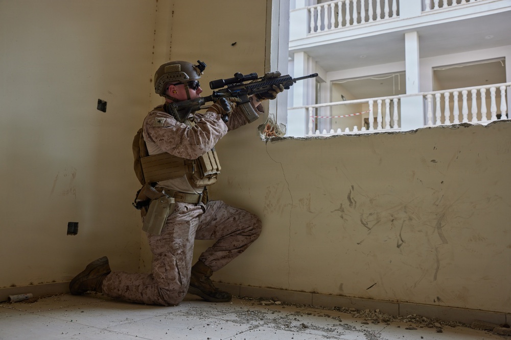 U.S. Marines with FAST Company Europe conduct live sim close quarter battle training