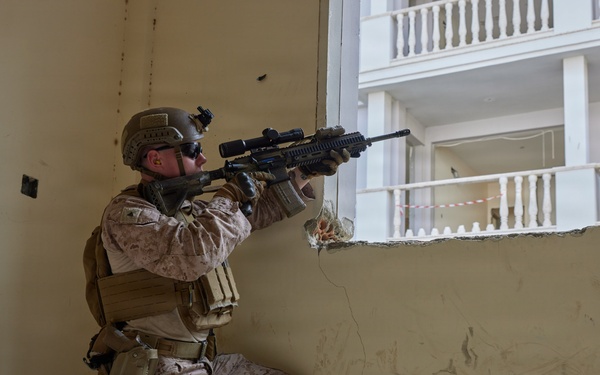 U.S. Marines with FAST Company Europe conduct live sim close quarter battle training
