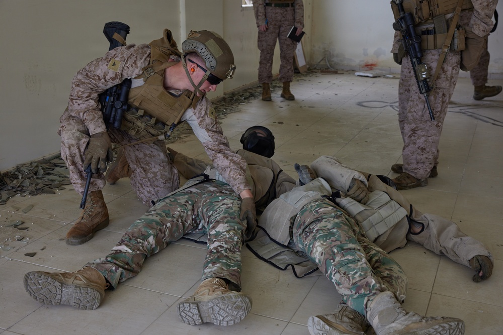 U.S. Marines with FAST Company Europe conduct live sim close quarter battle training