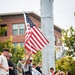 The American flag is held high while climbing the 110 flights of stairs