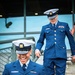 Coast Guard members smiling during the 110 flight climb