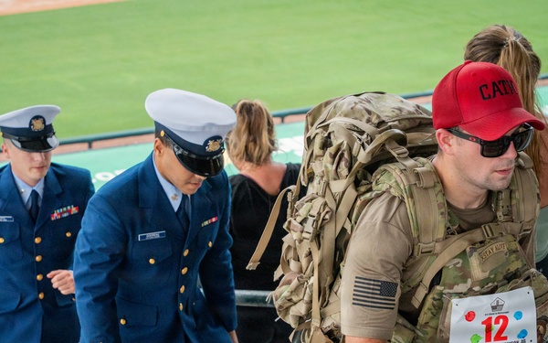 Coast Guard members participate in the climb while wearing their bravo uniform