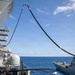 USS Tripoli Refuels USS Rafael Peralta At Sea