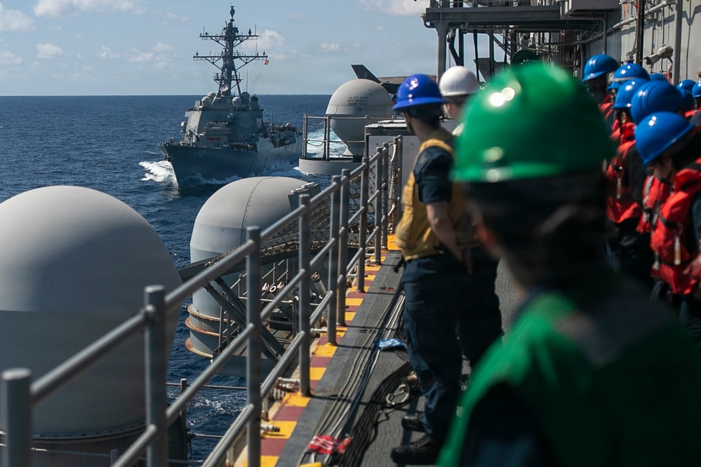 USS Tripoli Refuels USS Rafael Peralta At Sea