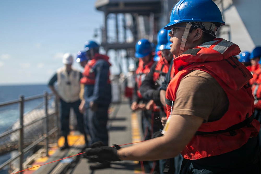 USS Tripoli Refuels USS Rafael Peralta At Sea