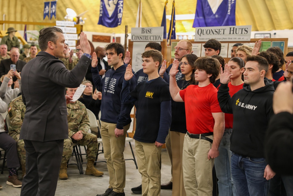 Secretary of War Pete Hegseth administers the oath of enlistment military recruits in Rhode Island