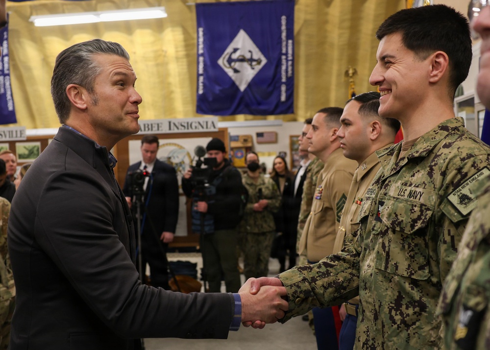Secretary of War Pete Hegseth recognizes U.S. Navy recruiters during oath of enlistment ceremony in Rhode Island