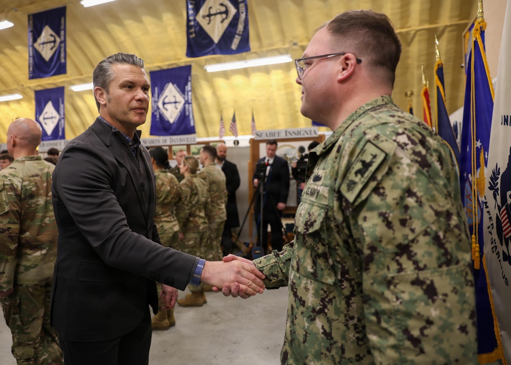 Secretary of War Pete Hegseth recognizes U.S. Navy recruiters during oath of enlistment ceremony in Rhode Island