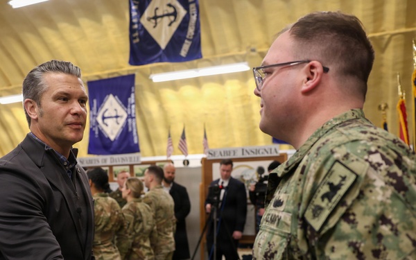 Secretary of War Pete Hegseth recognizes U.S. Navy recruiters during oath of enlistment ceremony in Rhode Island