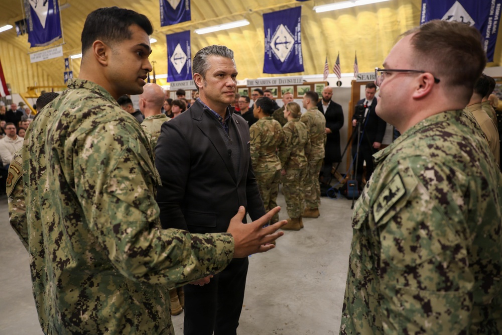 Secretary of War Pete Hegseth recognizes U.S. Navy recruiters during oath of enlistment ceremony in Rhode Island