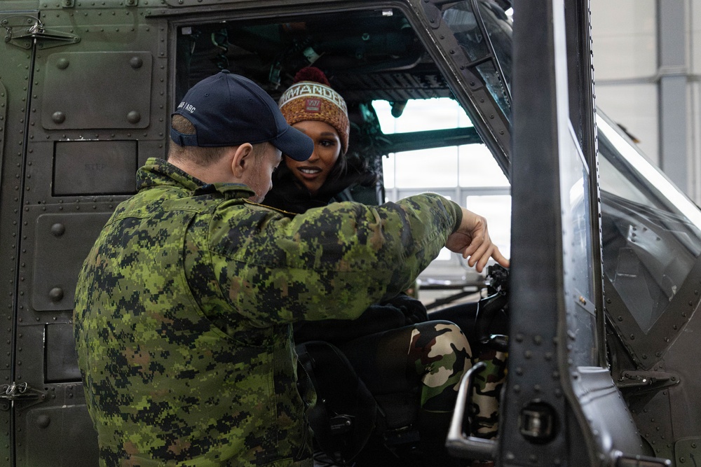 NFL Cheerleaders Receive a Tour of a Helicopter