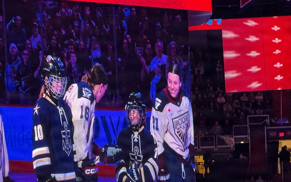 Child of SSP Employee Meets Professional Hockey Player and U.S. Olympian