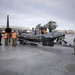 176th Wing air transportation specialists and loadmasters work together
