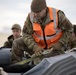 176th Wing air transportation specialists and loadmasters work together