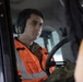 176th Wing air transportation specialists and loadmasters work together