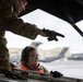 176th Wing air transportation specialists and loadmasters work together