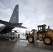 176th Wing air transportation specialists and loadmasters work together